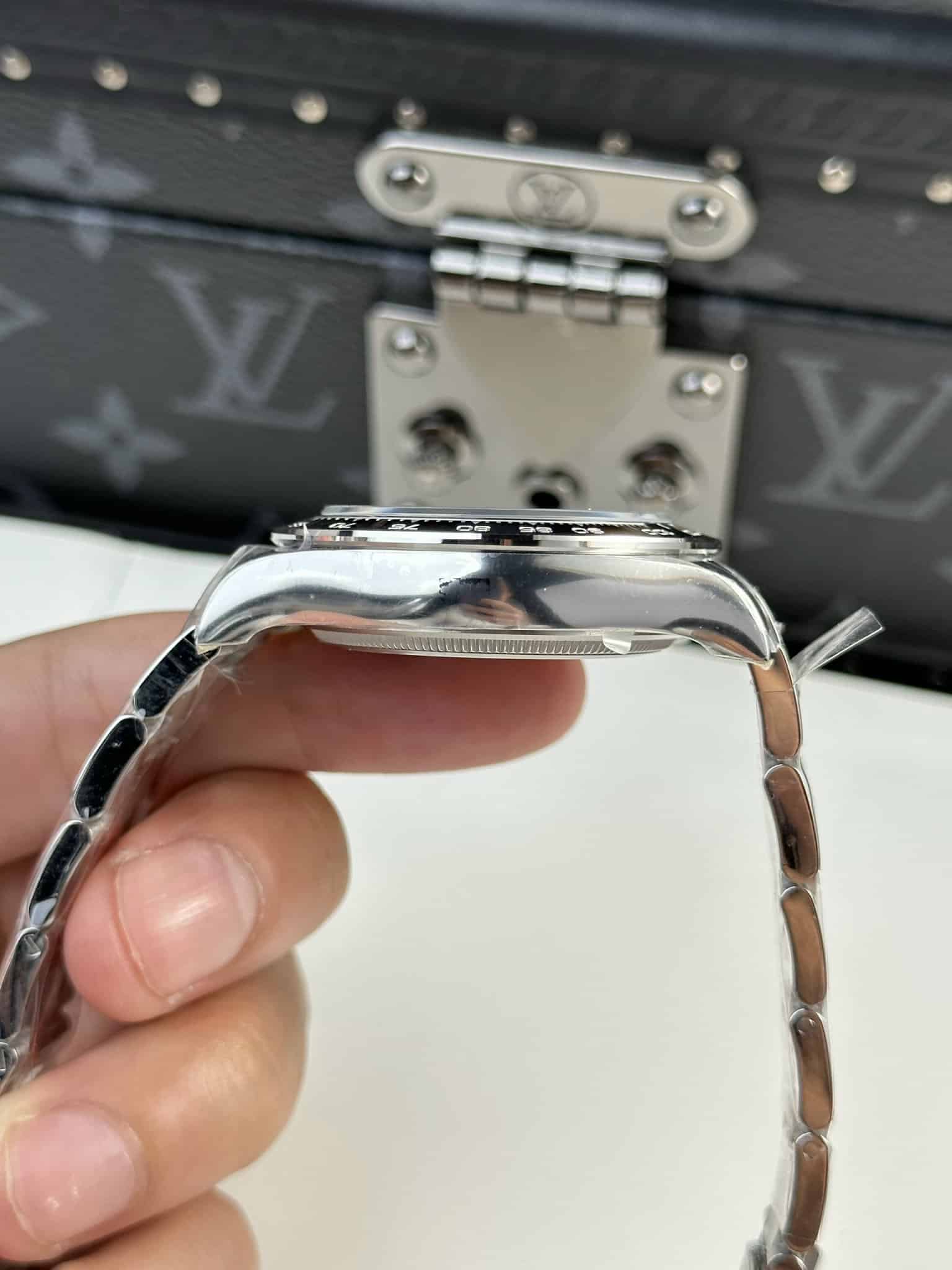 Rolex Daytona 126500LN copy black dial — bezel macro