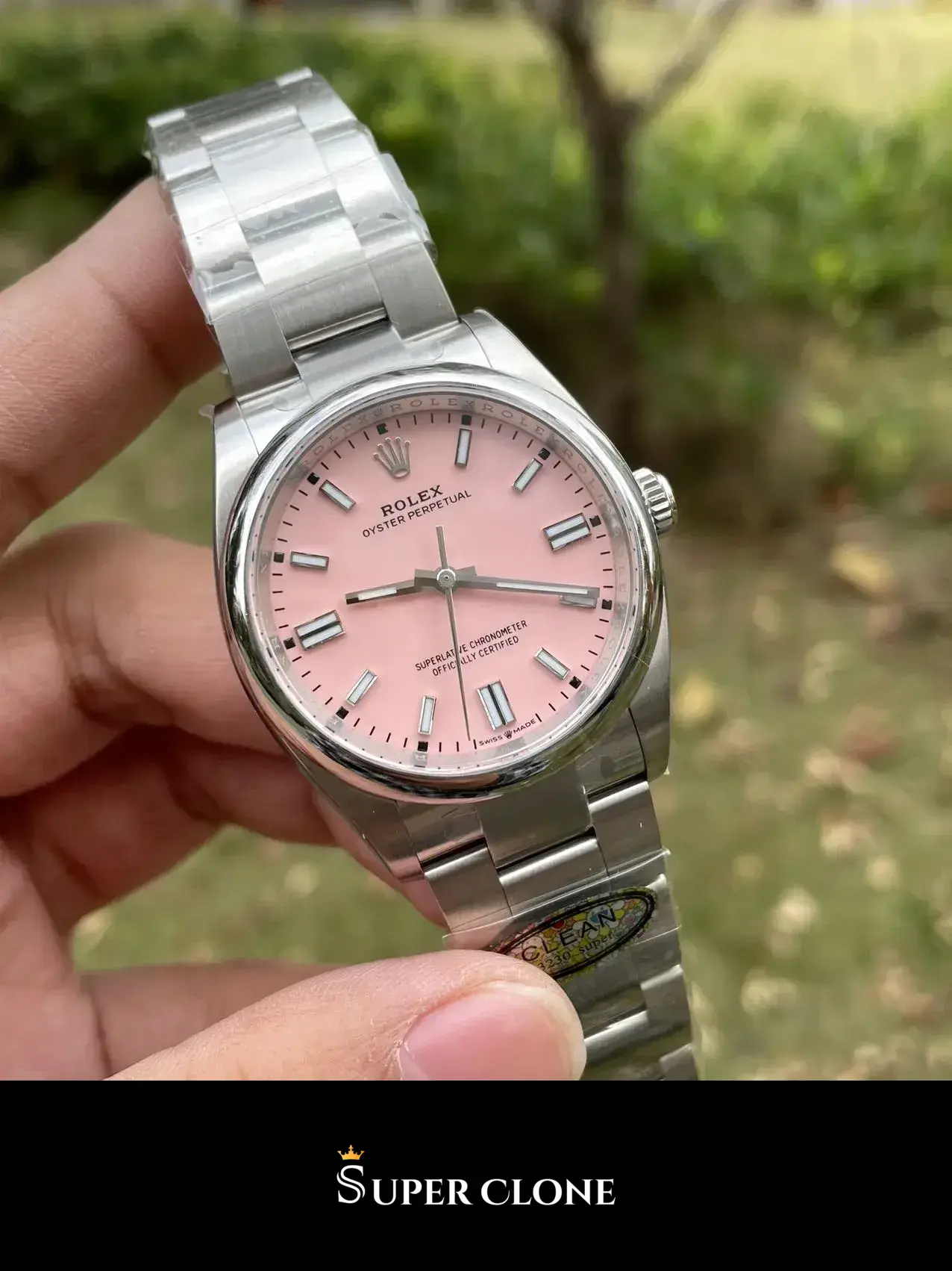 Rolex Oyster Perpetual 126000 replica black dial — angled view