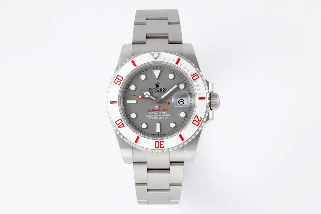Whole watch laid flat on pale grey, bracelet extended above and below the case