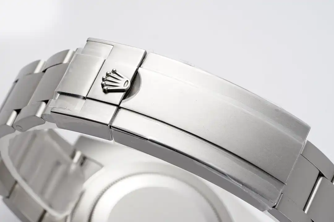 Oyster clasp closed, crown logo pressed into the folding cover, brushed finish