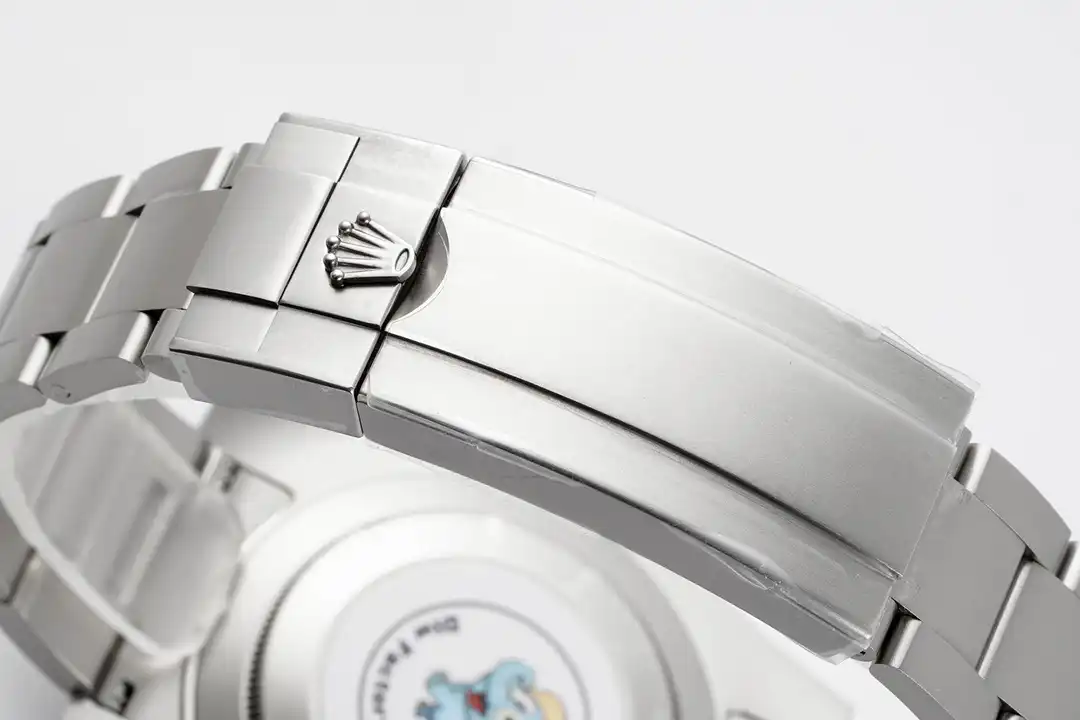 Folding clasp closed, crown emblem stamped into the polished cover