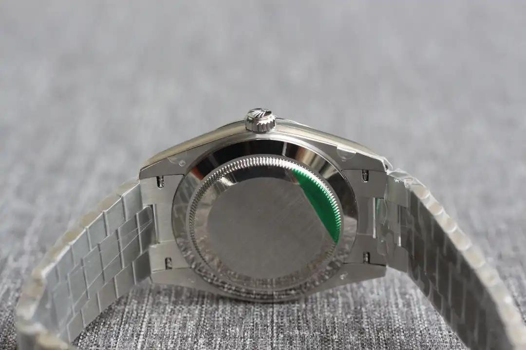 Rolex Day-Date 228239, fluted bezel, sapphire crystal
