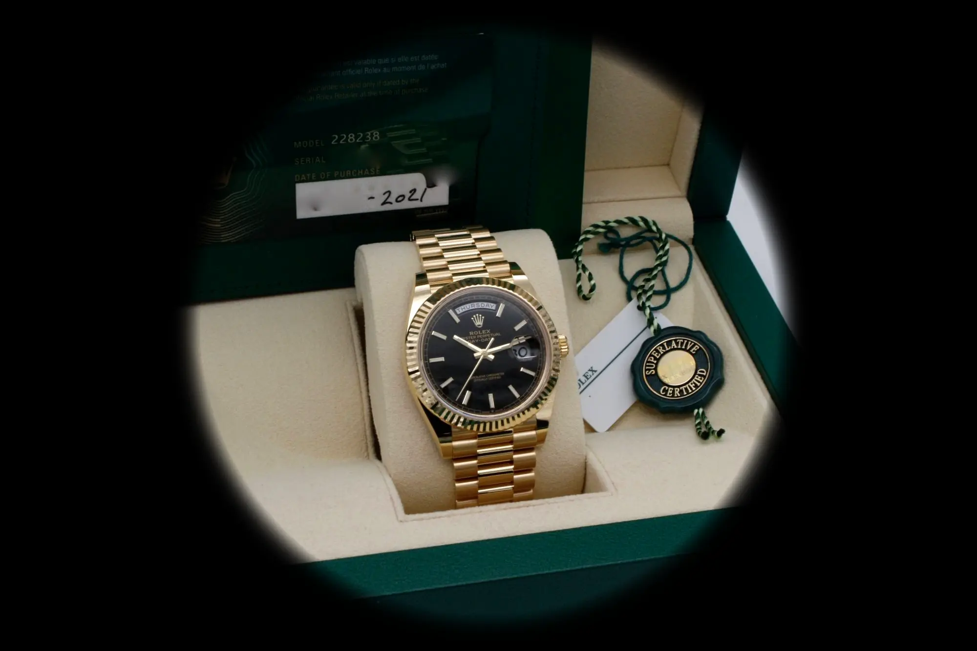 Rolex Day-Date 228238 Swiss replica black dial — angled view