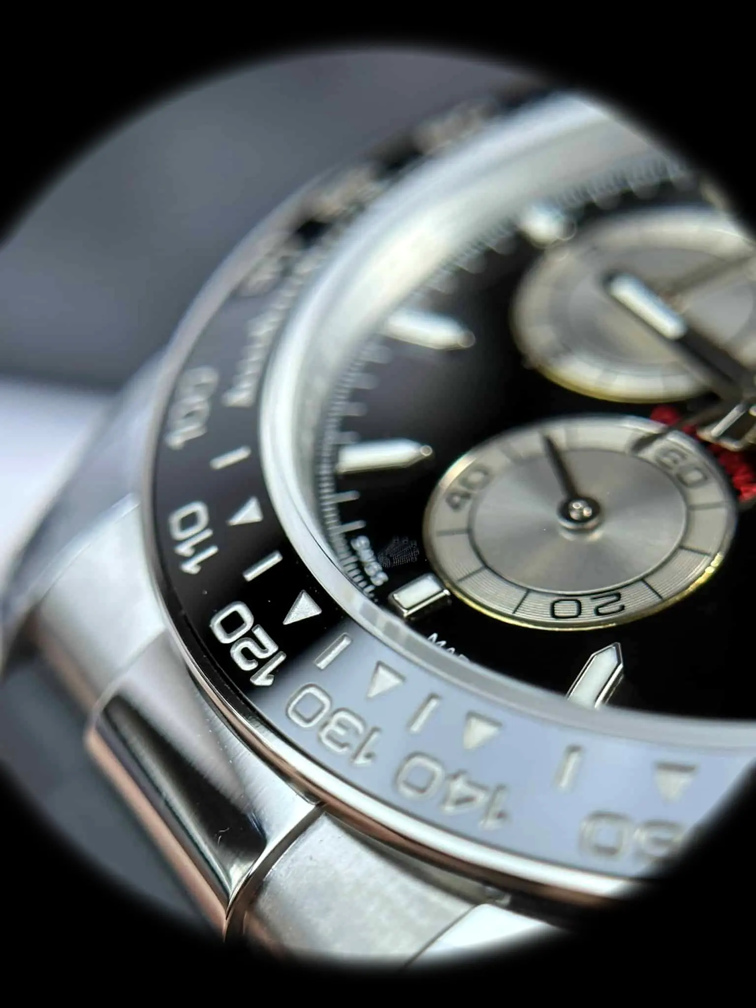 Daytona 126519LN Swiss clone bright black dial — bezel macro