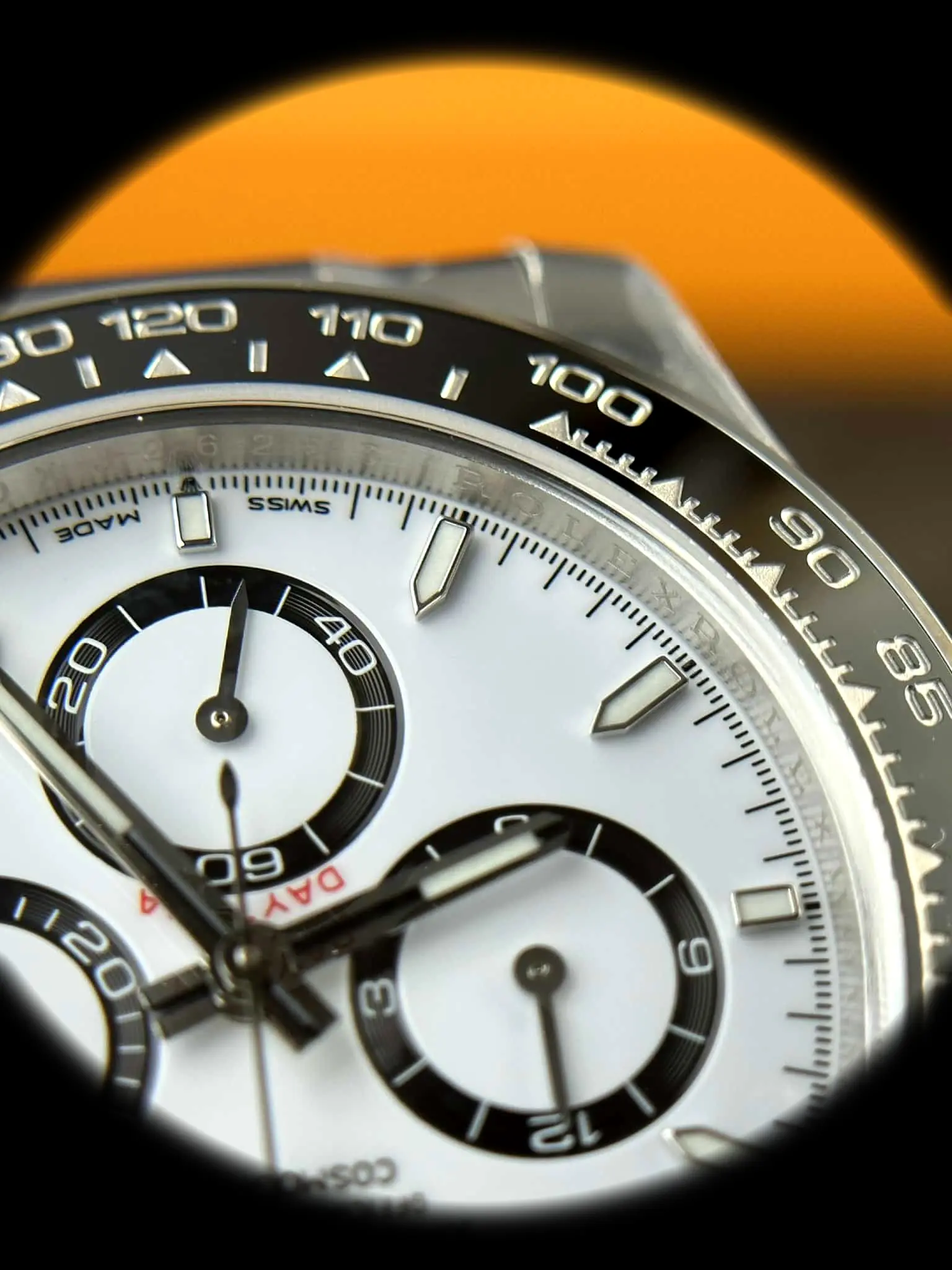 Rolex Daytona 126500LN Swiss replica white dial — bezel macro