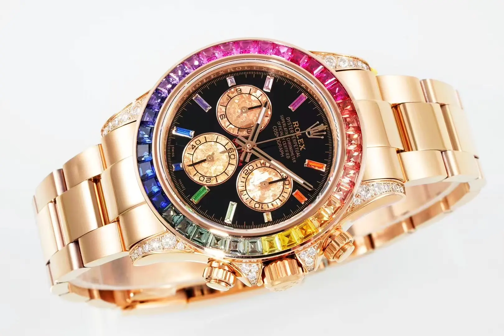 Rolex Daytona Rainbow 116595RBOW angled left, Everose gold Oyster bracelet and diamond crown guard