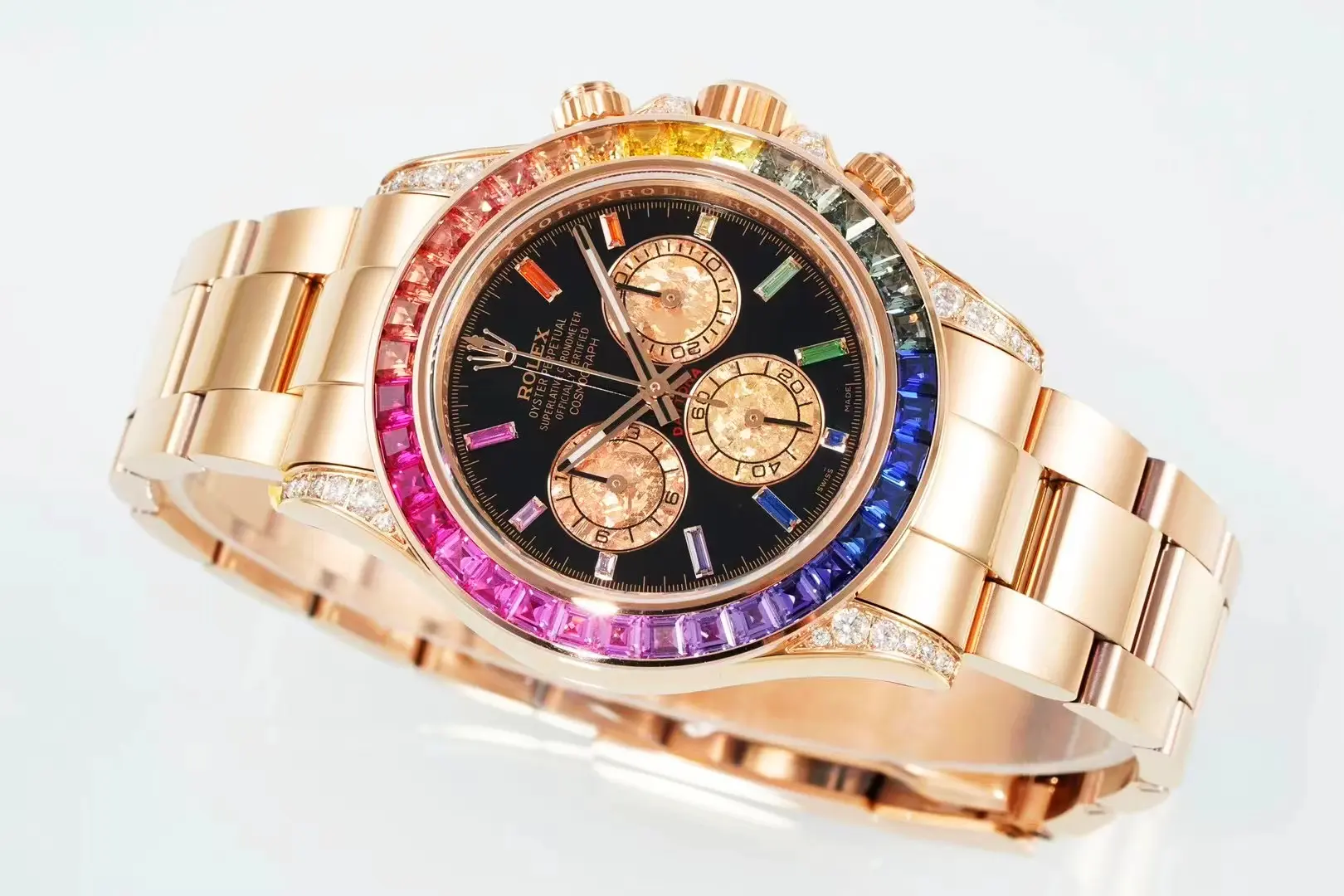Rolex Daytona Rainbow 116595RBOW angled right showing black dial and rainbow sapphire bezel sweep