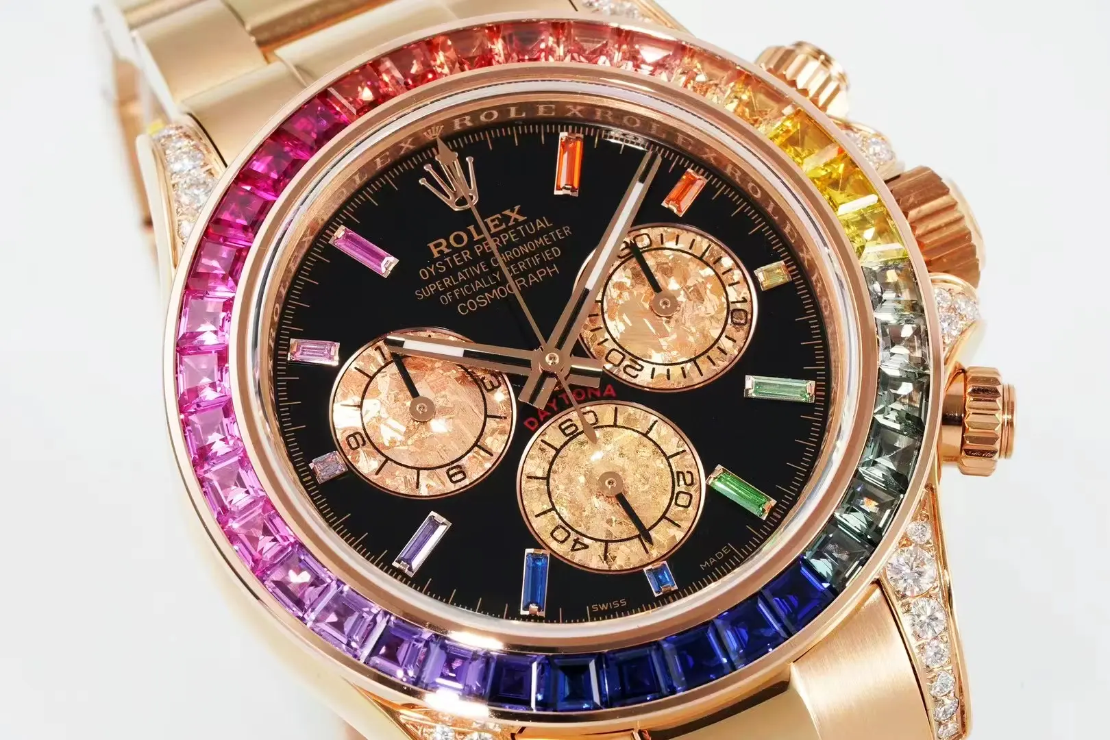 Rolex Daytona Rainbow 116595RBOW close-up of pink gold-crystal subdials on black lacquer dial