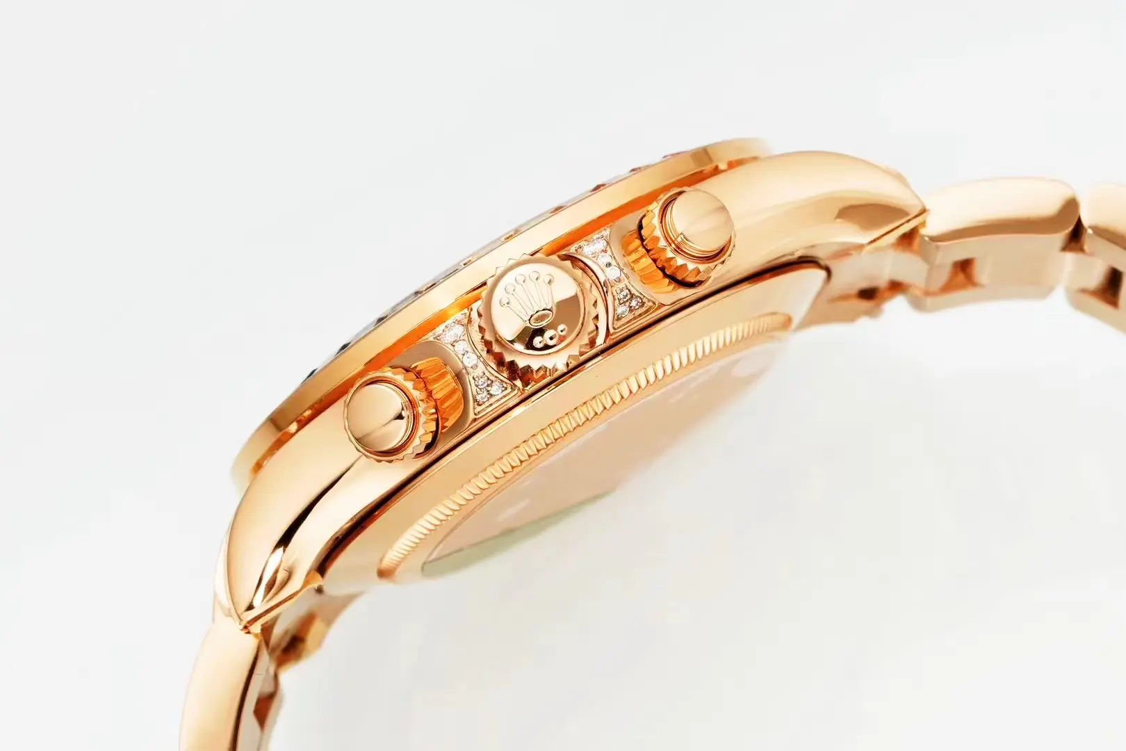 Rolex Daytona Rainbow 116595RBOW side profile, Everose chronograph pushers and diamond crown guard