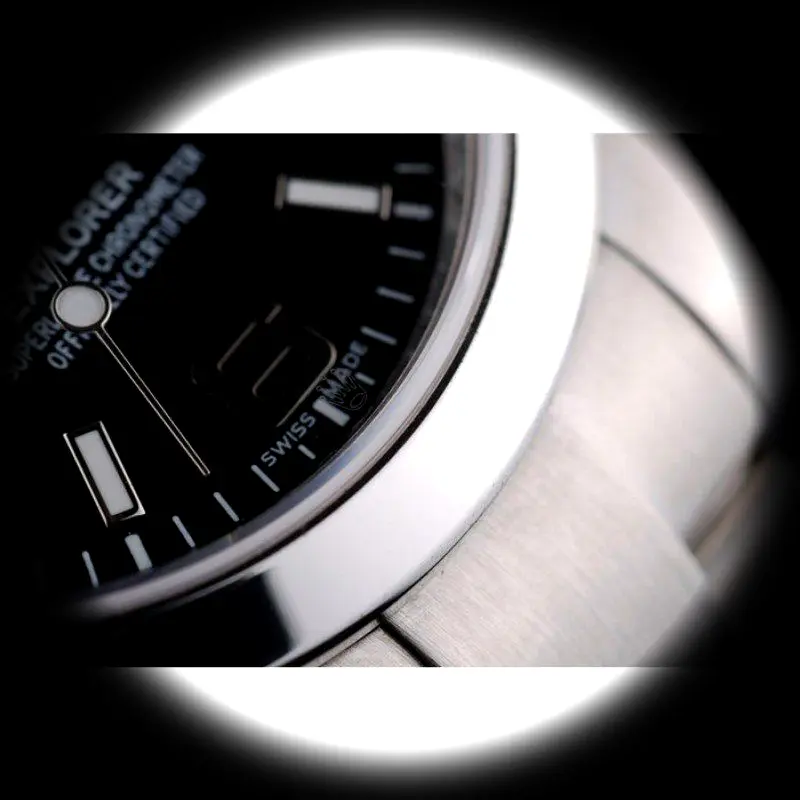 Rolex Explorer 42002 Swiss replica black dial — bezel macro