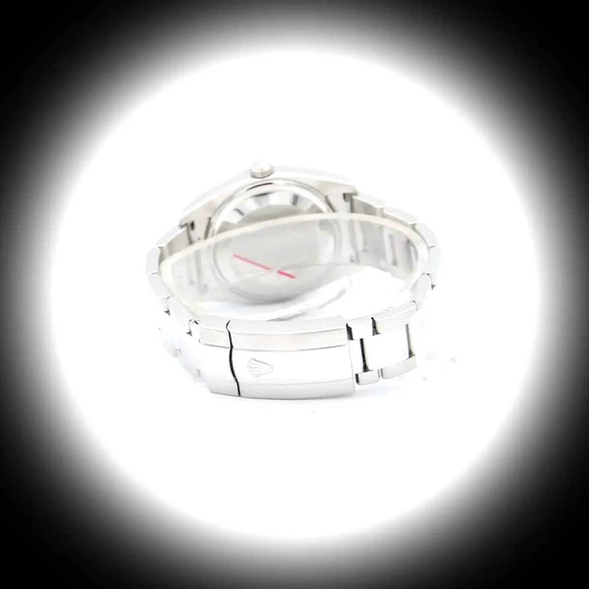 Oyster Perpetual 115200 Swiss clone salmon dial — caseback detail