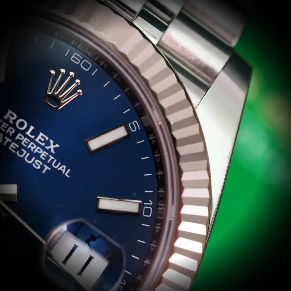 Datejust 126334 Swiss replica blue dial — bezel macro