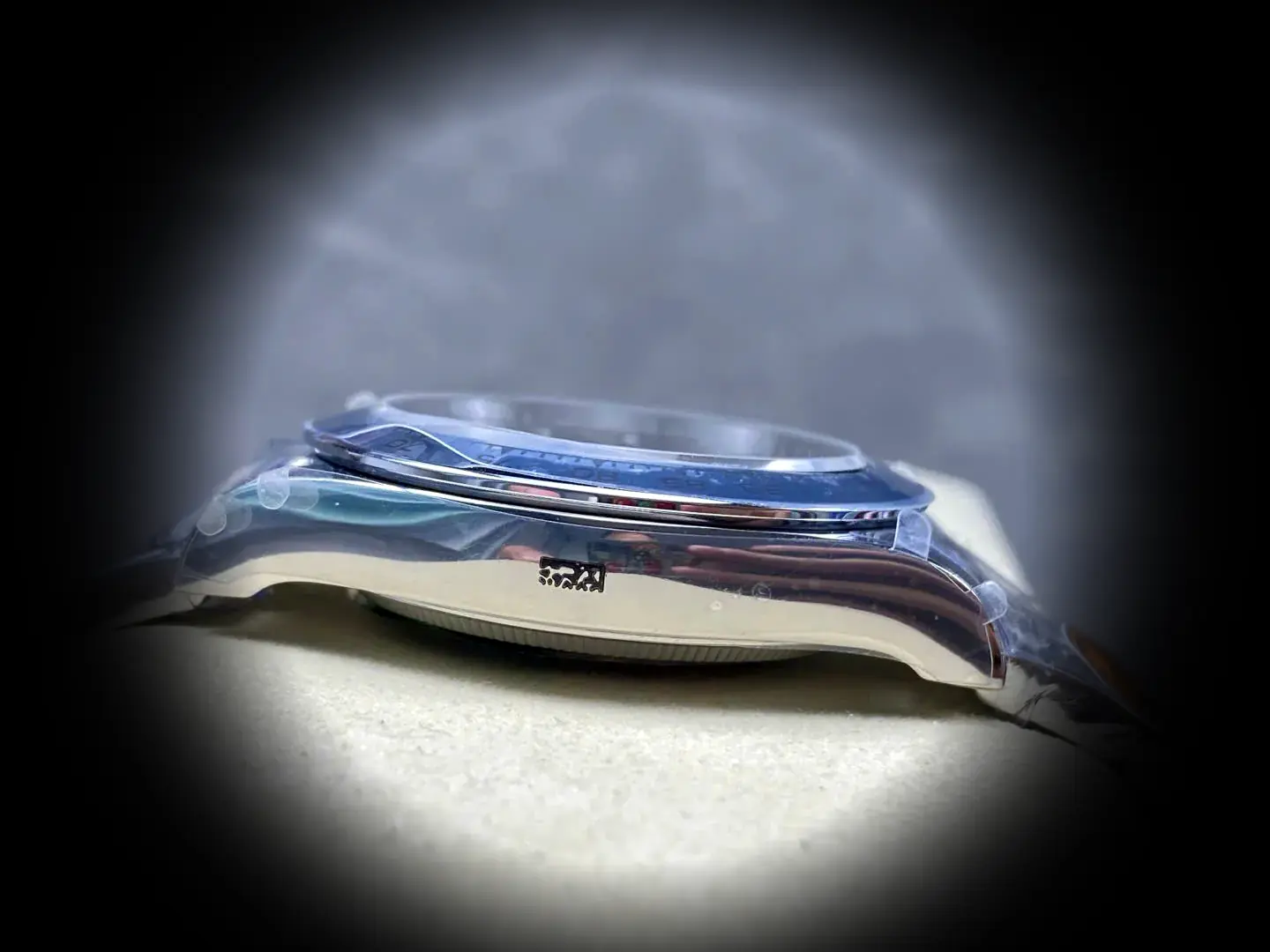 Daytona 126509 Swiss clone bright blue dial — bezel macro