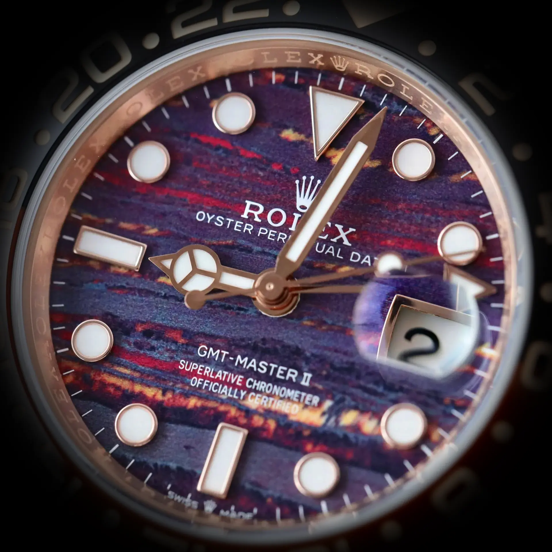 GMT-Master 126715CHNR Swiss clone tiger iron dial — bezel macro