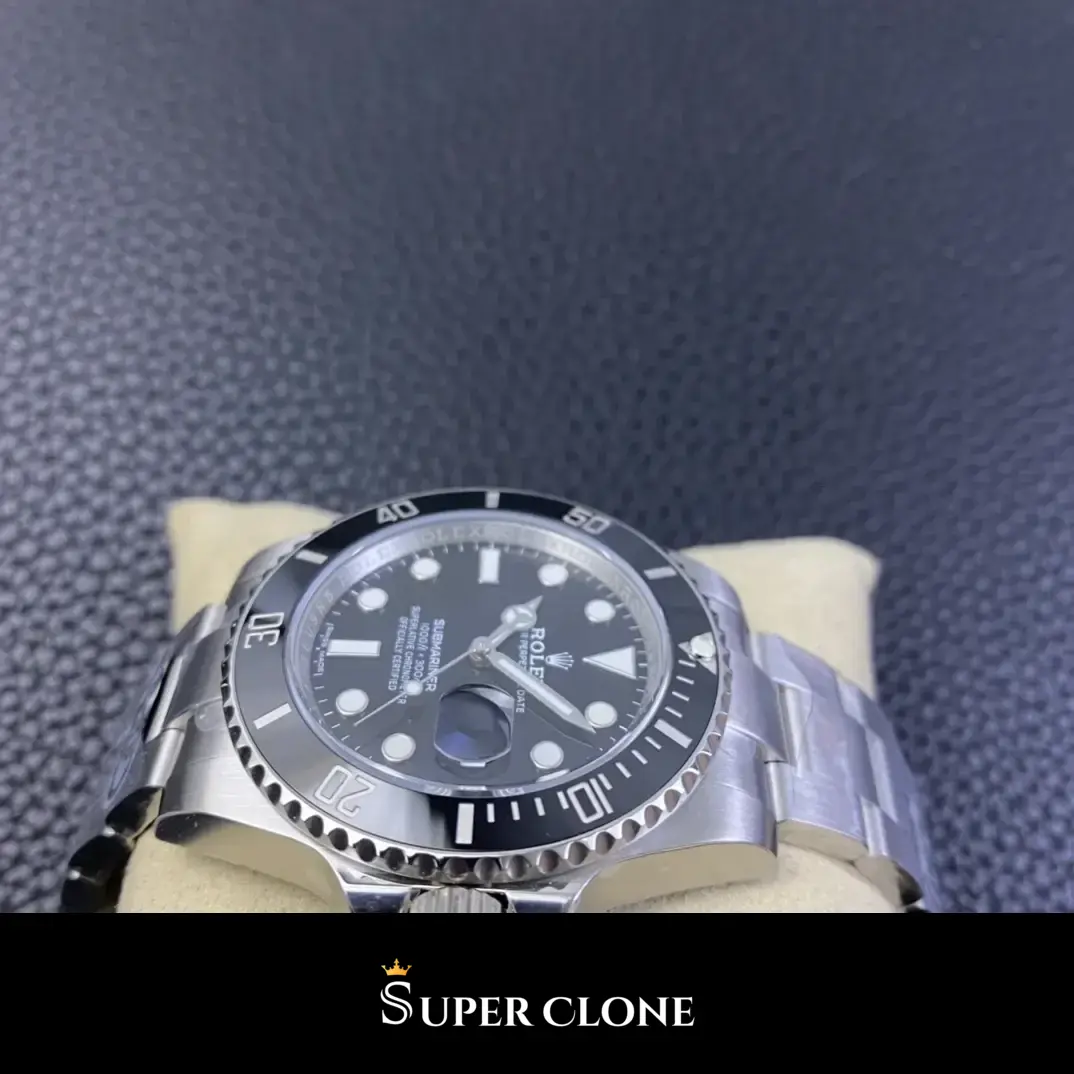 Plain steel Submariner on a cream cushion, black bezel insert marked in tens, brushed Oyster links