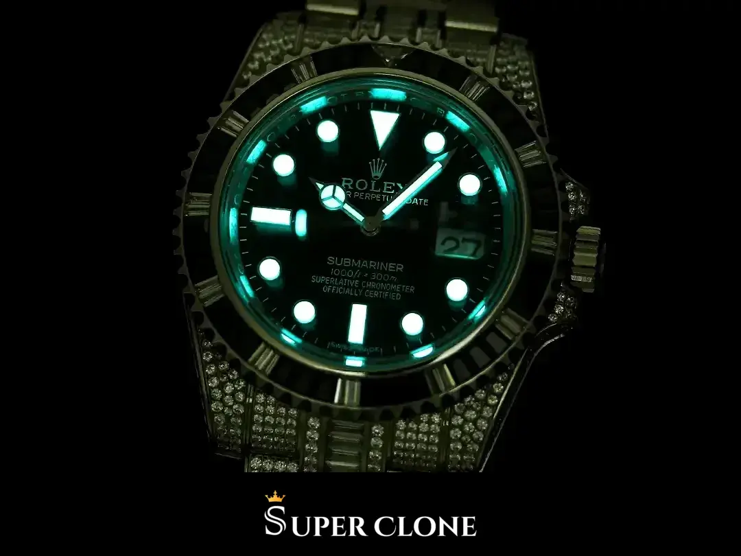 Low-light lume, green glow across hour plots, hands and the minute track ring