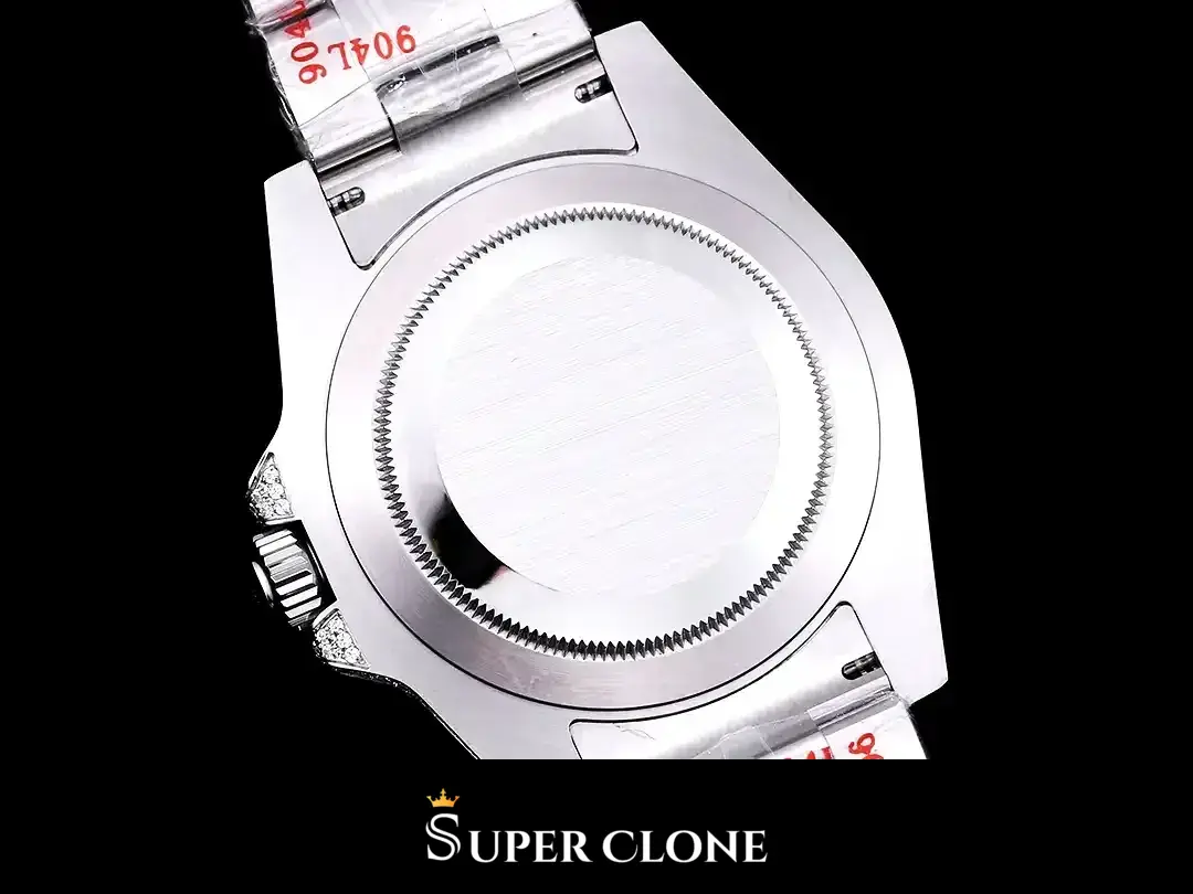 Caseback closed and unengraved, brushed disc inside a toothed edge, crown at left