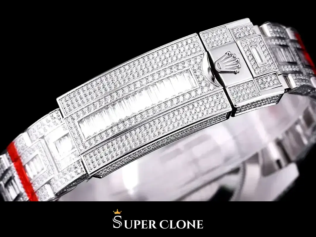 Folding clasp macro, coronet on the release lever, baguette row down a fully set cover