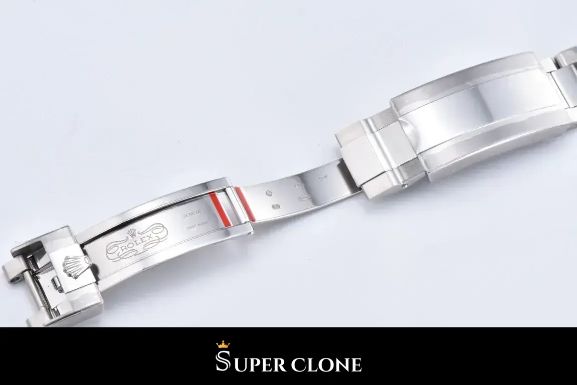 Clasp opened flat, inner blade and safety catch seen from above