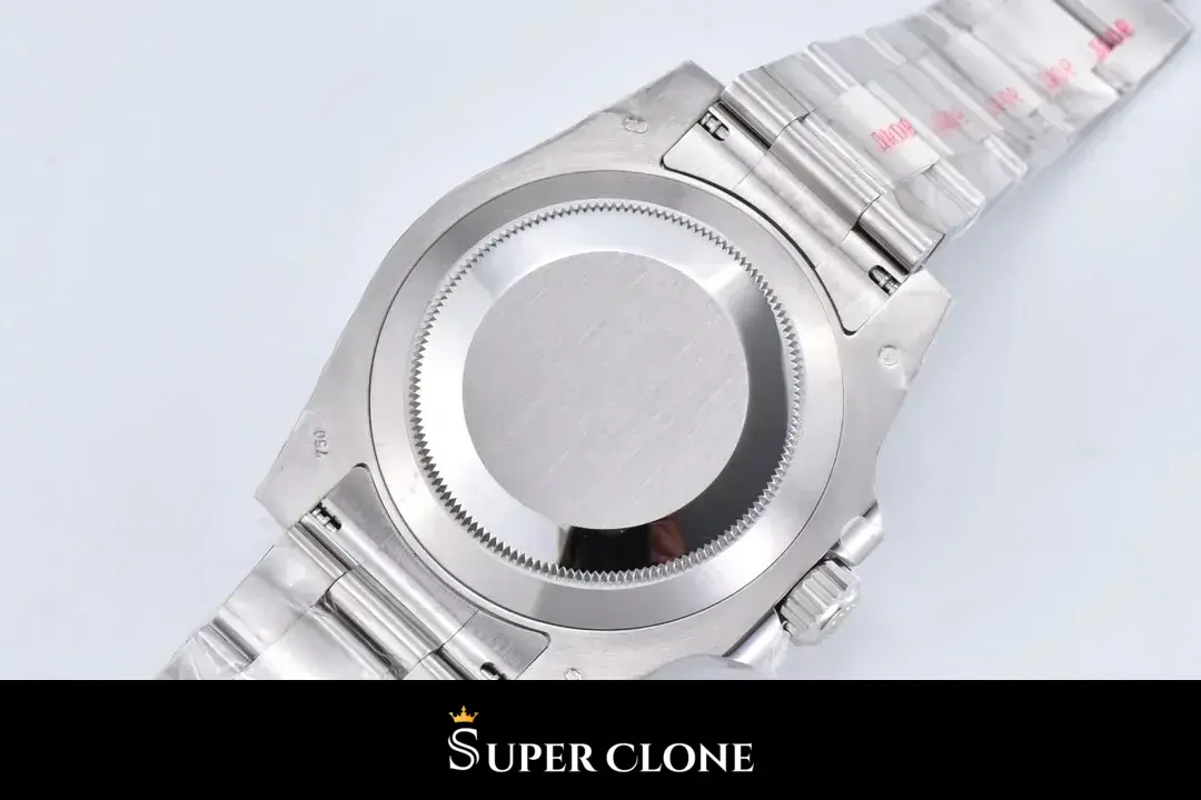 Caseback face up, brushed disc set inside a fluted outer rim