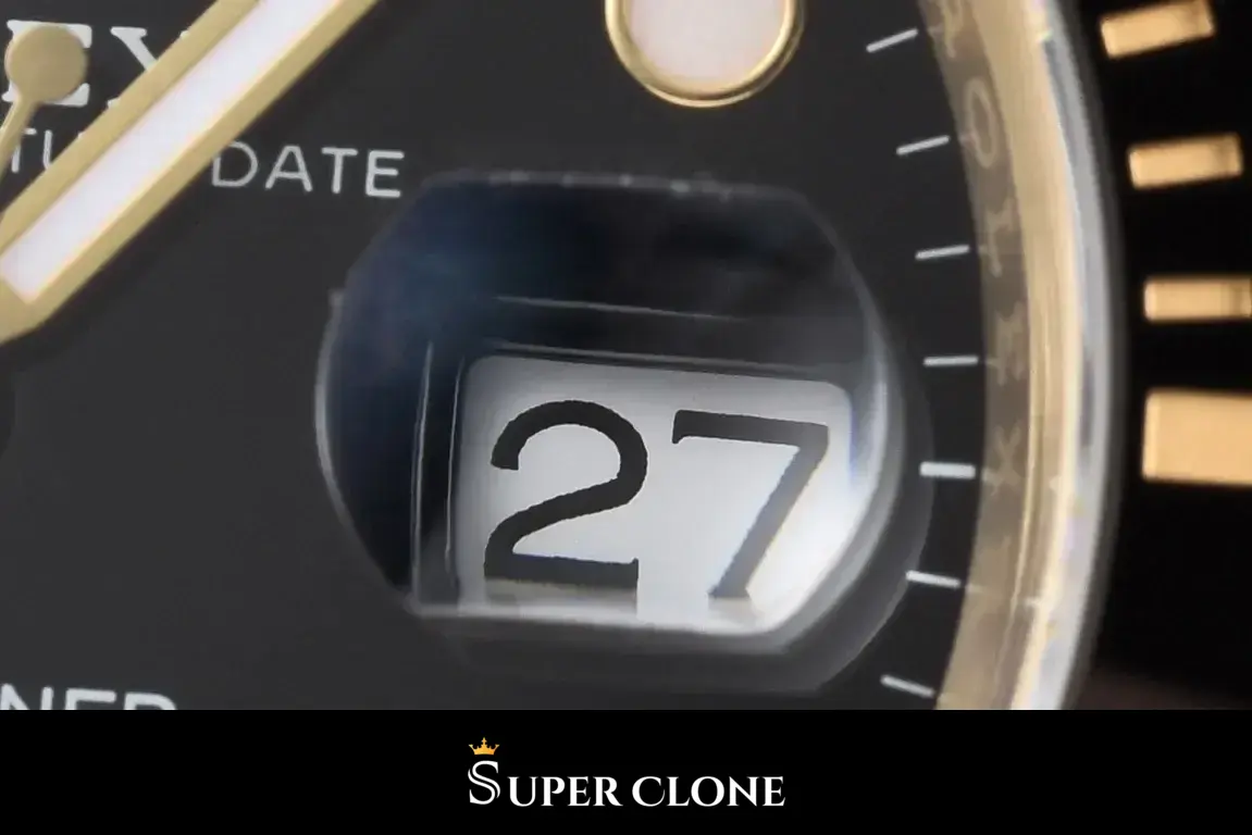 Cyclops lens magnifying the date at three, printed minute track curving past it