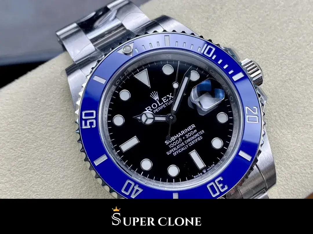 Blue ceramic bezel insert, engraved minute scale and lume pip at twelve