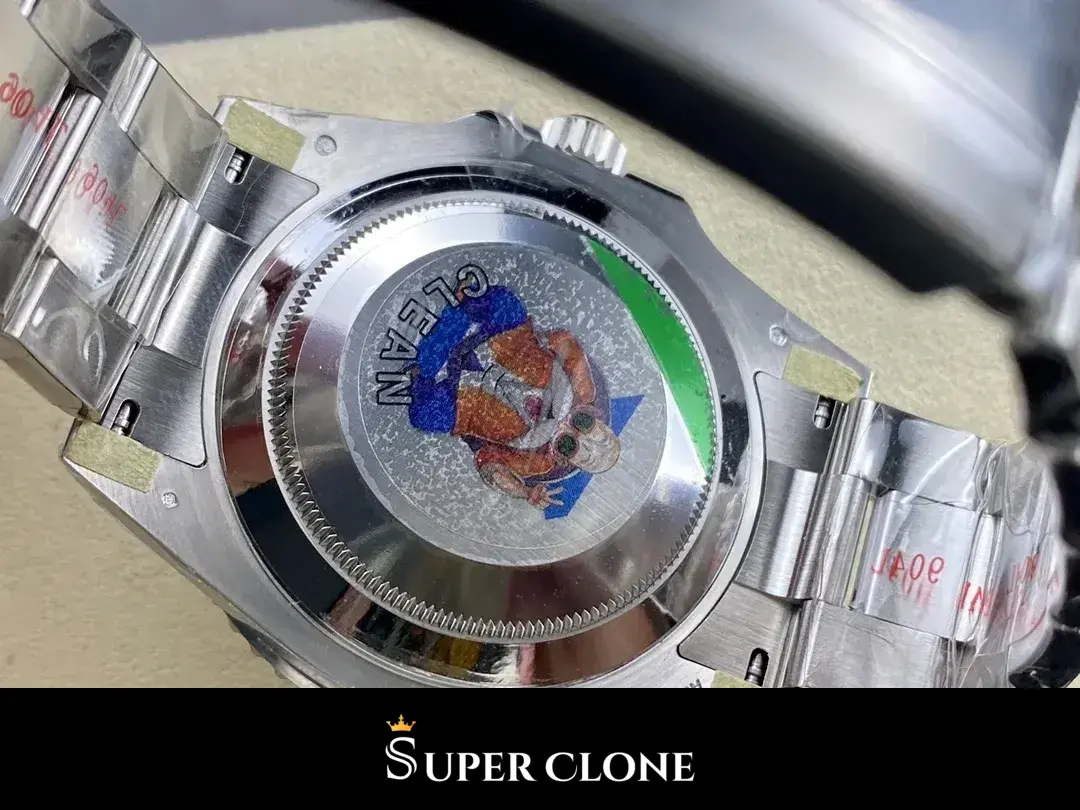 Caseback face up, solid disc seated inside a fluted outer rim