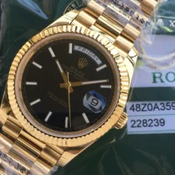 Rolex Day-Date Ref. m228238 Black Dial Fluted Bezel