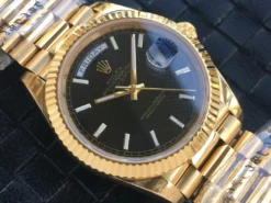 Rolex Day-Date Ref. m228238 Black Dial Fluted Bezel