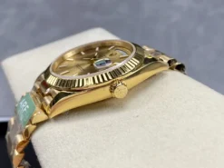 Rolex Day-Date Ref. m228238 Gold Dial Fluted Bezel