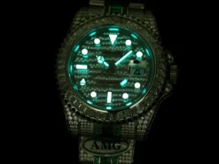 Replica Rolex GMT-Master II 40mm 116769TBR Green Diamonds Bracelet Texture Close-Up